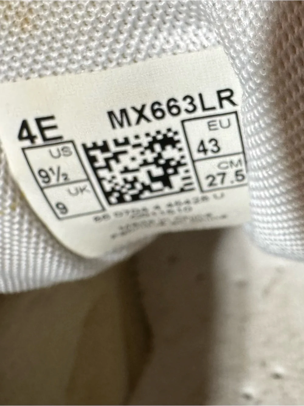 New Balance Men’s White Sneakers with Navy and Gray Accents